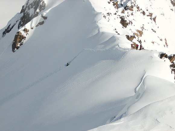 PNH guide Tucker digging a pit on slope